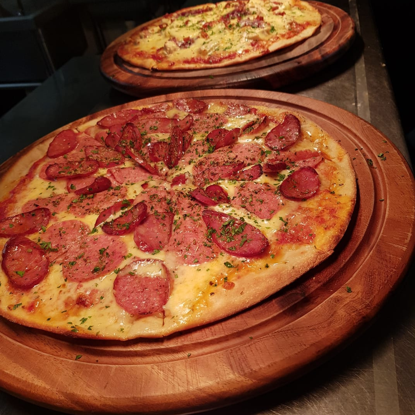 round board with pizza