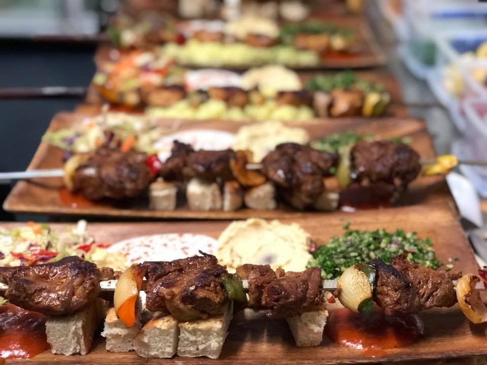 food presentation on acacia wood platter